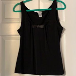 Sleeveless black top with bow